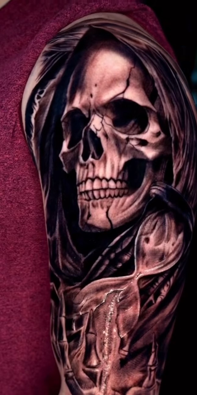 Grim reaper skull with hourglass black and grey half sleeve tattoo