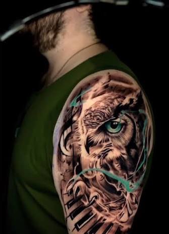 Owl and piano keys black and grey shoulder tattoo