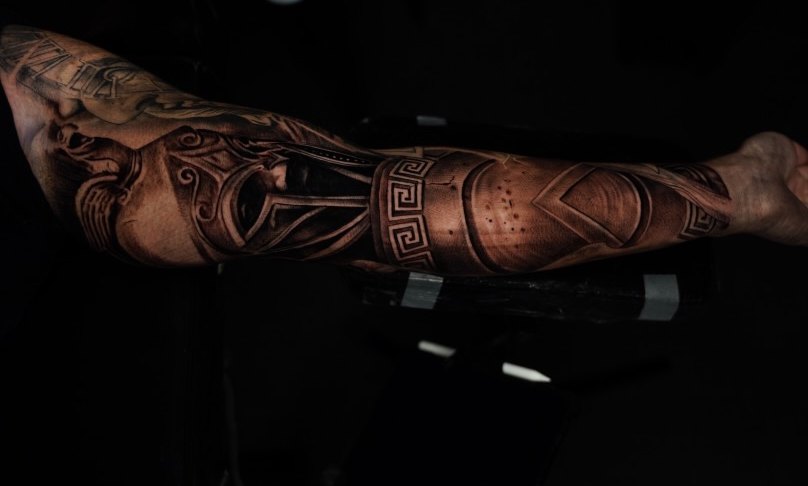 Trojan warrior black and grey full forearm tattoo by Bubba Irwin, historical realism