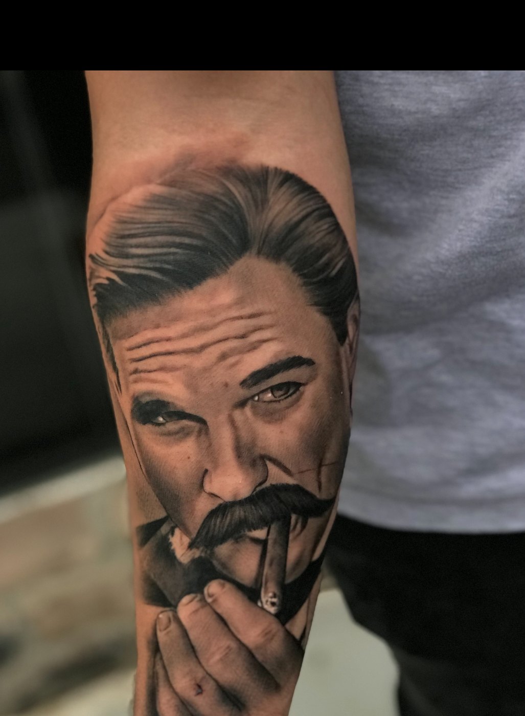 Realistic Doc Holliday portrait tattoo in black and grey by Bubba Irwin