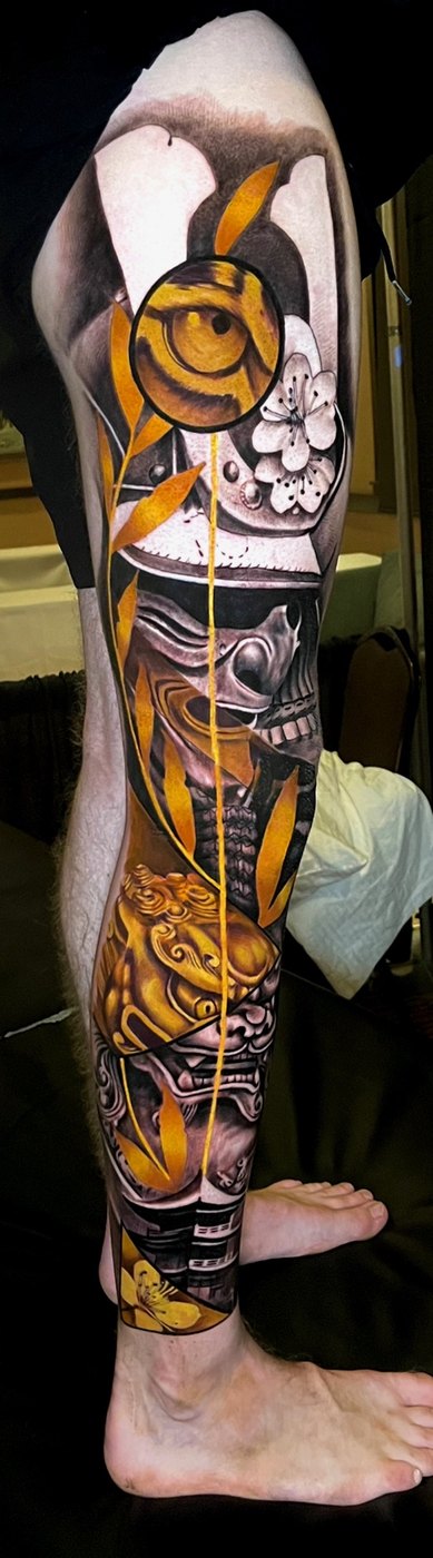 Samurai and foo dog full leg sleeve tattoo with gold accents by Bubba Irwin